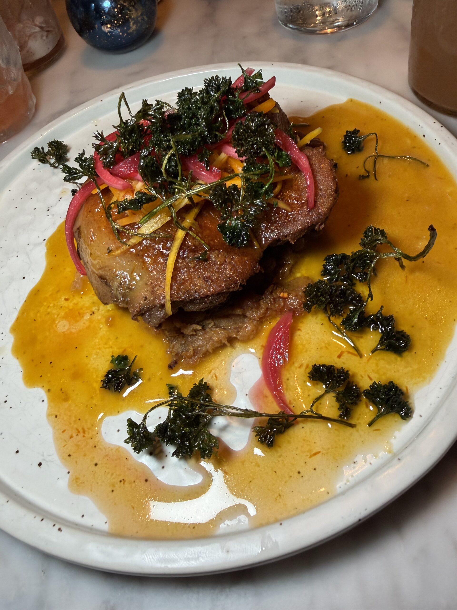 Duck leg with orange Peruvian sauce and mofongo at Lima Bistro Aruba